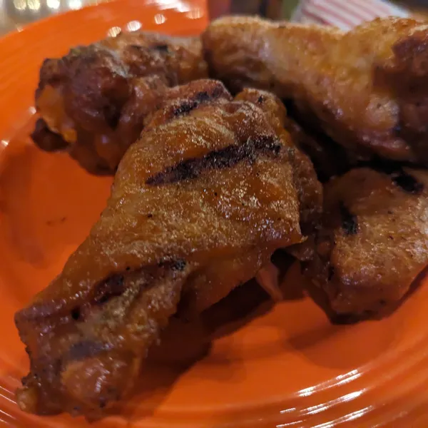 Spicy peach habañero wings