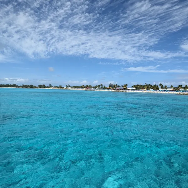 Brilliant turquoise waters and a far off beach.