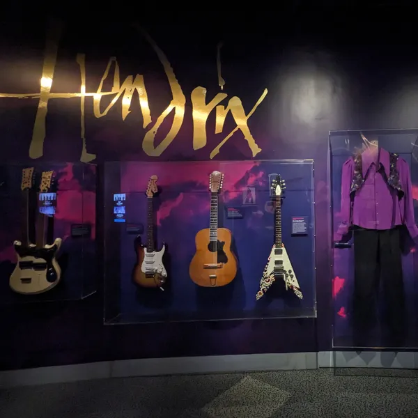 Jimmy Hendrix guitars and outfits.