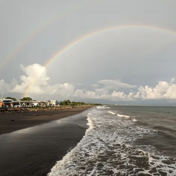 Double rainbow over the beach